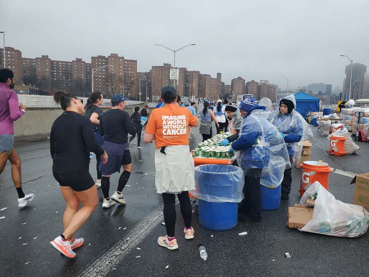 Mile 8 Water Station, FDR Drive, Manhattan, 2025 United Airlines NYC Half Marathon, March 16, 2025